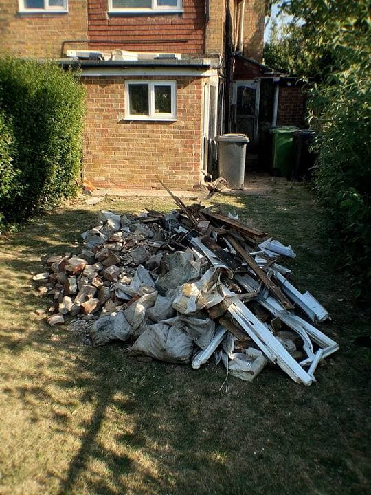 Before: a typical construction waste job before we started