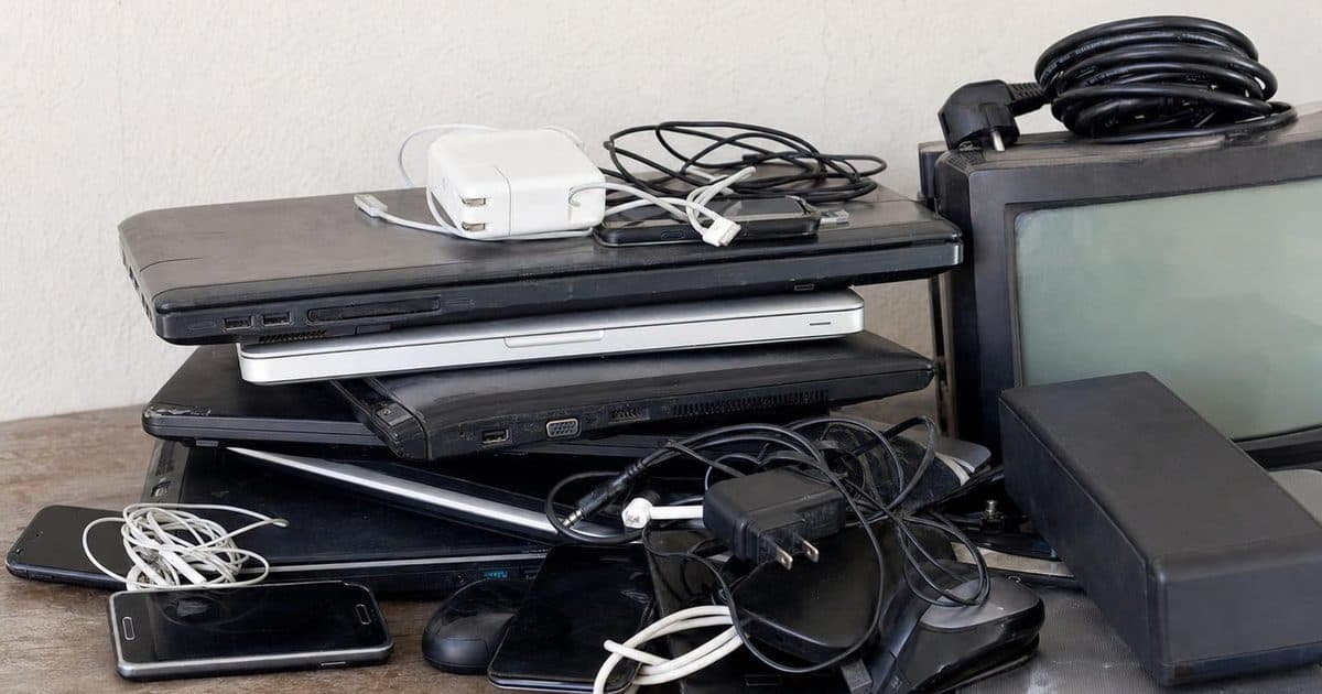 Old electronic devices and cables sorted for recycling in Eastbourne