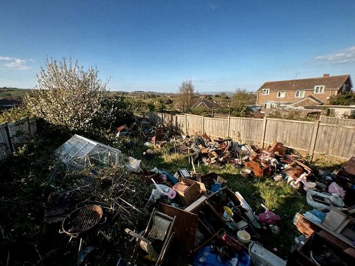 Before: a typical garden clearance job before we started